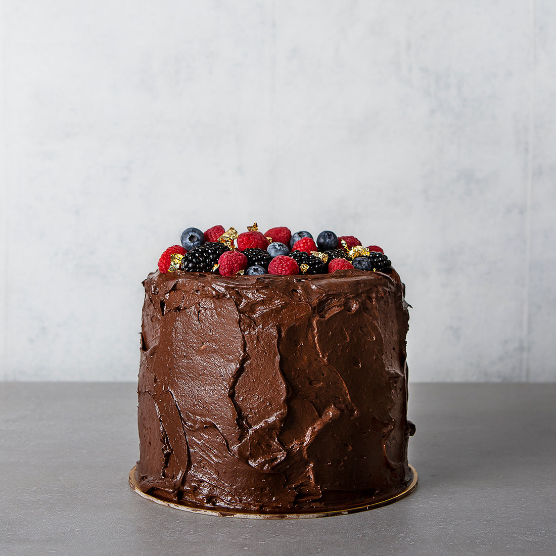 Berry gold chocolate celebration cake