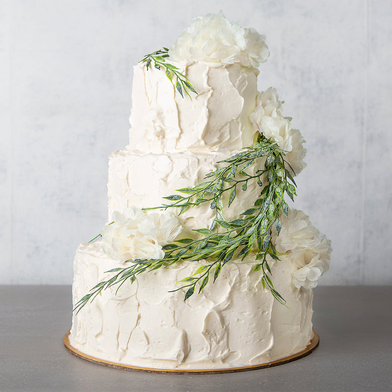 vanilla buttercream celebration cake with flowers